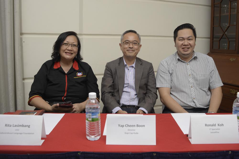 Sponsors of awards for the Action10 Filmmakers' Competition: L to R - Rita Lasimbang, CEO Kadazandusun Language Foundation; Yap Cheen Boon, Director, Kopi Cap Kuda; Ronald Koh, IT Specialist, JuiceAPac